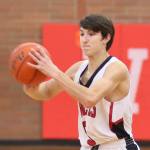 Coupeville&rsquo;s Joey Lippo prepares to pass for the Wolves. (Photo by John Fisken)