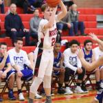 Ethan Spark puts up a three-pointer for the Wolves. (Photo by John Fisken)