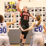 Mia Littlejohn shoots a floater during the first quarter. (Photo by John Fisken)