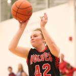 Four Wolves earn first-team honors / Basketball