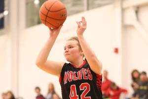 Four Wolves earn first-team honors / Basketball