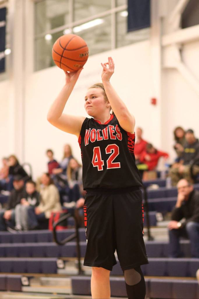 Kailey Kellner puts up a jumper in Thursday&rsquo;s district tournament game. (Photo by John Fisken)
