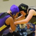Diandra Dominguez, left, locks up with Lynden&rsquo;s Kali Spady. (Photo by Jim Waller/Whidbey News-Times)