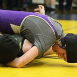 Oak Harbor&rsquo;s Ella Erikson pins Lynden&rsquo;s Crystal Cuellar. (Photo by Jim Waller/Whidbey News-Times)