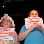 Maggie Garrett, left, and Alyssa Monger hold up certificates after participating in the first &lsquo;Whidbey Has Talent&rsquo; at Oak Harbor High School last year. Photo by Ron Newberry/Whidbey News-Times