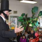 Alan Schell of Oak Harbor dresses up as Abraham Lincoln and impersonates the former U.S. president in the spirit of President&rsquo;s Day Wednesday, Feb. 15, 2017 at Oak Harbor Christian School. Children from kindergarten through sixth grade attended the address. Photo by Ron Newberry/Whidbey News-Times
