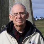 Volunteer Dick Malone of Oak Harbor stands on the grounds of Fort Casey State Park in Coupeville Thursday, Feb. 16, 2017. Malone, who provides guided tours of the former World War I-era army post and is a docent at Admiralty Head Lighthouse, was named &lsquo;Volunteer of the Year&rsquo; by Washington State Parks this month. Photo by Ron Newberry/Whidbey News-Times