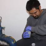 A sampler from CH2M, a global engineering company and contractor for the Navy, tests water from the community wells at the Admiral&rsquo;s Cove Water District Monday, Feb. 20, 2017. The tests were conducted to look for certain chemicals that might&rsquo;ve come from Coupeville&rsquo;s Outlying Landing Field. Photo by Ron Newberry/Whidbey News-Times.