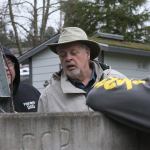 Doug Smith, commissioner with the Admiral&rsquo;s Cove Water District, watches as a sampler from CH2M, a global engineering company and contractor for the Navy, gets ready to test water from one of the district&rsquo;s community wells Monday, Feb. 20, 2017. The tests were conducted to look for certain chemicals that might&rsquo;ve come from Coupeville&rsquo;s Outlying Landing Field. Photo by Ron Newberry/Whidbey News-Times.