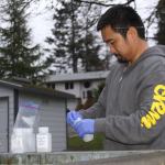 A sampler from CH2M, a global engineering company and contractor for the Navy, tests water from the community wells at the Admiral&rsquo;s Cove Water District Monday, Feb. 20, 2017. The tests were conducted to look for certain chemicals that might&rsquo;ve come from Coupeville&rsquo;s Outlying Landing Field. Photo by Ron Newberry/Whidbey News-Times.