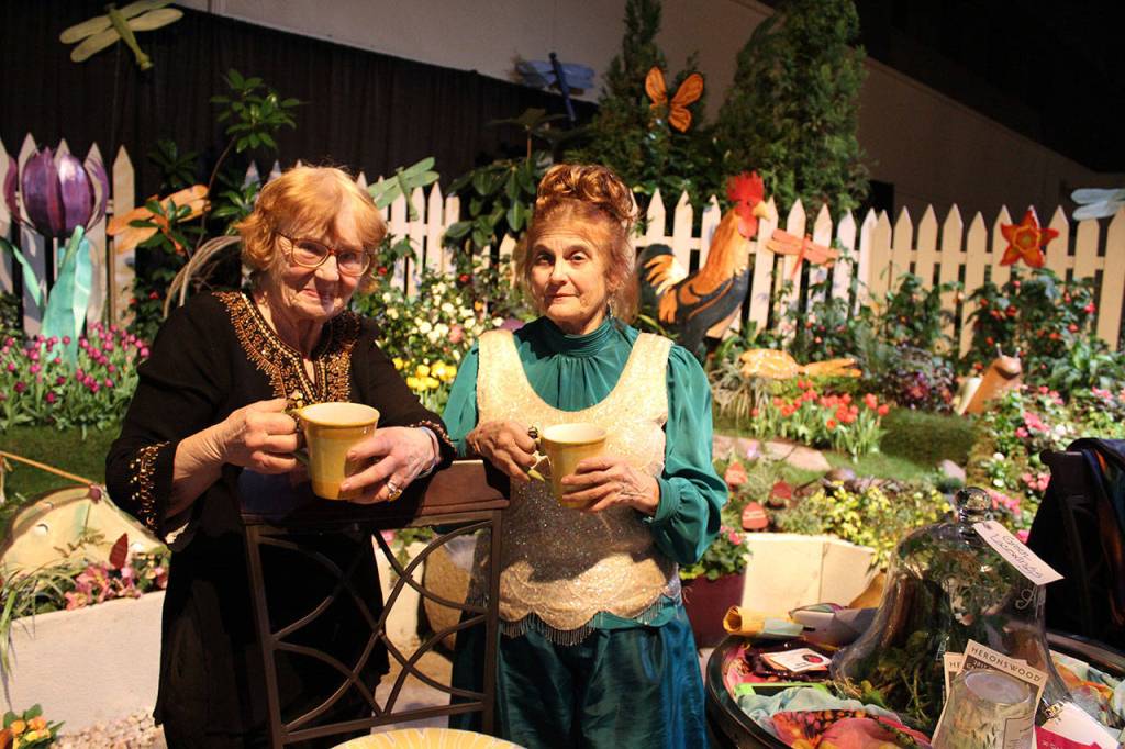 For more than 20 years, Vanca Lumsden of ALBE Rustics in Freeland (left) and Judith Jones of Fancy Fronds Nursery of Gold Bar have combined forces to create fanciful, fun displays at the annual Northwest Flower & Garden Show in Seattle. They&rsquo;ve won Best of Show twice. Photo by Patricia Guthrie/Whidbey News-Times