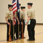 Jonathan Francisco, left, Clifford Hartley, Alex Hartley and Tristin Macaluso being inspected by AE1 Dylan Biddle, CNATTU Whidbey. (Photo by John Fisken)