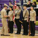 Shaina Aquirre, left, Mikayla Hobbs, Taylor Kesler and Jasmine Schultz being inspected by Ltjg Rob Morris, VAQ-129.(Photo by John Fisken)