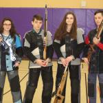 Elena Flake, left, Michael White, Julia Flake and Austin McBride will be joined by captain Mia Gehrmann in Alabama next week at the national Service Air Rifle Championships. (Photo by Jim Waller/Whidbey News/Times)