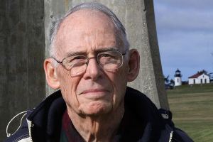 Volunteer Dick Malone of Oak Harbor stands on the grounds of Fort Casey State Park in Coupeville Thursday, Feb. 16, 2017. Malone, who provides guided tours of the former World War I-era army post and is a docent at Admiralty Head Lighthouse, was named &lsquo;Volunteer of the Year&rsquo; by Washington State Parks this month. Photo by Ron Newberry/Whidbey News-Times