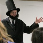 Alan Schell of Oak Harbor dresses up as Abraham Lincoln and impersonates the former U.S. president in the spirit of President&rsquo;s Day Wednesday, Feb. 15, 2017 at Oak Harbor Christian School. Children from kindergarten through sixth grade attended. Photo by Ron Newberry/Whidbey News-Times