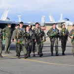 Pilots and aircrew from Tactical Electronic Warfare Squadron 130 return home to Naval Air Station Whidbey Island Dec. 30, 2016, from a six month deployment and were reunited with their families just in time for the new year. Photo by Michael Watkins/Whidbey News-Times