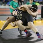 Nick Dugin fights to get control. (Photo by John Fisken)