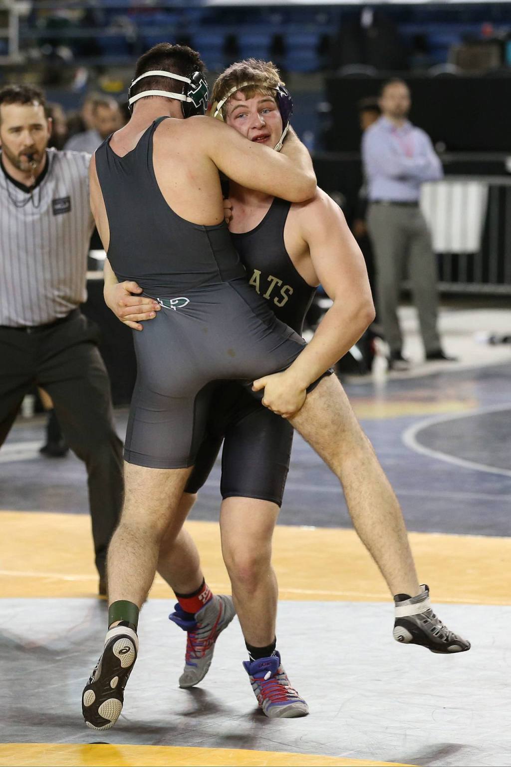 Nick Dugin goes for a takedown. (Photo by John Fisken)