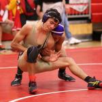 Oak Harbor teammates Caleb Fitzerald, front, and Zion Gomez square off in the match for third and fourth places at the Wesco North Tourament. Gomez won 11-3. (Photo by John Fisken)