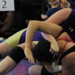 Caitlin Woodworth works to turn Laticia Garcia of Nooksack Valley in the first round of the Regional Tournament. (Photo by Jim Waller/Whidbey News-Times)