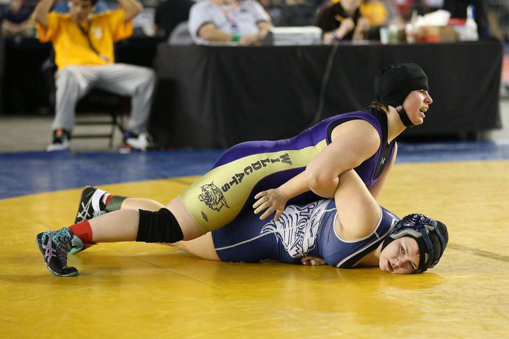 Caitlin Woodworth wins the battle for fifth place. (Photo by John Fisken)