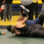 Sam Zook pins Arlington&rsquo;s Tristan Emery in the match for first place. (Photo by John Fisken)