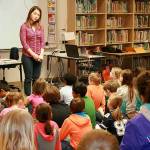 Oak Harbor High School graduate and published author Sandra Evans fields questions from a group of third and fourth graders at Crescent Harbor Elementary Friday. Photo by Daniel Warn/Whidbey News-Times.