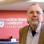 Dr. Tim Lawrence, director of Washington State University&rsquo;s Island County Extension in Coupeville, explains how a conference room will be used for WSU classes using video-conferencing equipment. Photo by Ron Newberry/Whidbey News-Times