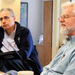 Michael Shuman, left, author of a report on the &ldquo;hidden costs&rdquo; of Naval Air Station Whidbey Island, visits Island County Economic Development Office in Coupeville on Tuesday. Larry Morrell, right, is with the citizen group, Sustainable Economy Collaborative, that hired Shuman for the economic impact investigation.