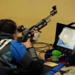 Elena Flake prepares to shoot in the All-Service Championships. (Photo by Lance Flake)