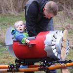 Scott Brazelton does a safety check before his son Wyatt goes on a ride around the roller coaster track Wednesday, March 1, 2017. Photo by Ron Newberry/Whidbey News-Times