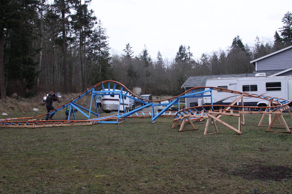 Scott Brazelton puts away the roller coaster cart on his Oak Harbor property Wednesday, March 1, 2017. Photo by Ron Newberry/Whidbey News-Times