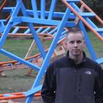 Scott Brazelton, a pilot assigned to VAQ-129 at Naval Air Station Whidbey Island, stands in front of the roller coaster he built on his Oak Harbor property Wednesday, March 1, 2017. Photo by Ron Newberry/Whidbey News-Times