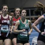 Alex Laiblin, right, runs to 19th place in the GNAC Indoor Track and Field Championships. (Photo by Loren Orr)