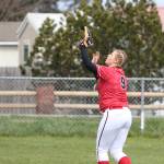 Left fielder Tiffany Briscoe looks in a fly ball Saturday. (Photo by John Fisken)