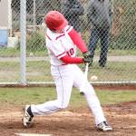 Jake Hoagland makes contact in the South Whidbey game. (Photo by John Fisken)