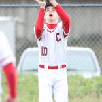 Coupeville&rsquo;s Jake Hoagland looks in a fly ball in the fifth inning. An inning later he made a game-saving catch for the Wolves. (Photo by John Fisken)