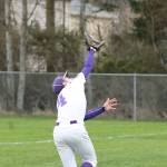 Oak Harbor first baseman Steven Richards runs down a pop up in foul territory. (Photo by John Fisken)