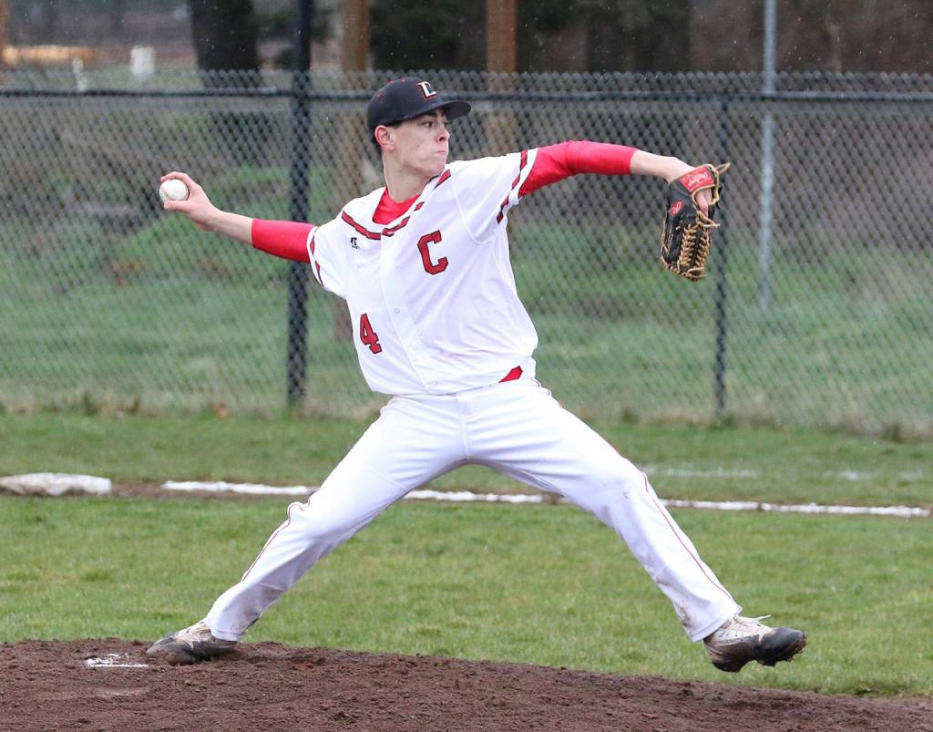 Hunter Smith fires a pitch Friday. (Photo by John Fisken)