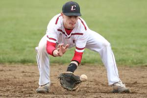 Wolves get win without getting a hit / Baseball