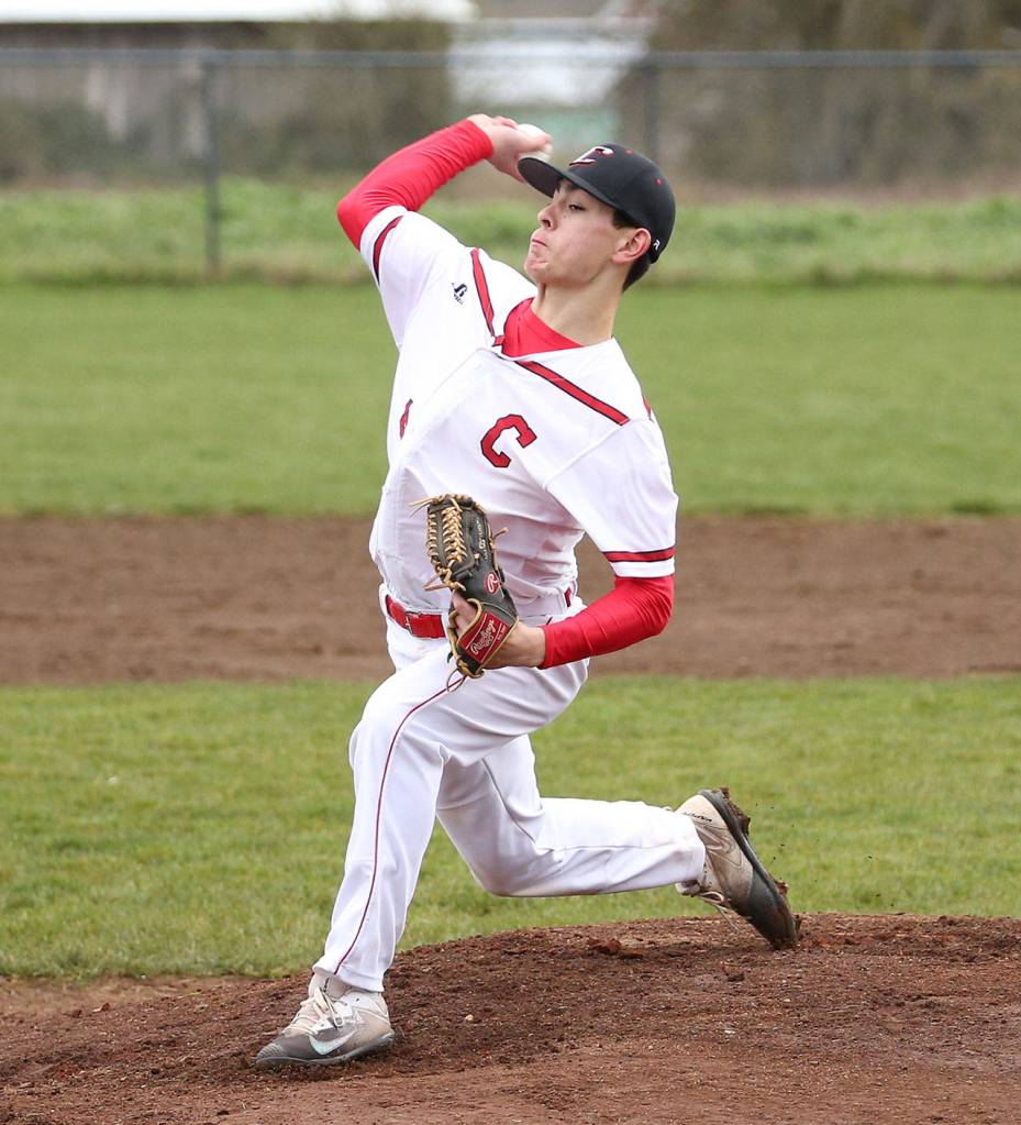 Hunter Smith throws a pitch before leaving the mound in the second inning with an injury. (Photo by John Fisken)