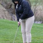 Dana Cornejo putts from the edge of the green. (Photo by John Fisken)