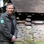 Jack Hartt, Deception Pass State Park manager, stands near a restroom near North Beach that has frequently closed due to a failing pump and sewer system. Fixing that issue is one of several projects in store for the state park in 2017. Photo by Ron Newberry/Whidbey News-Times