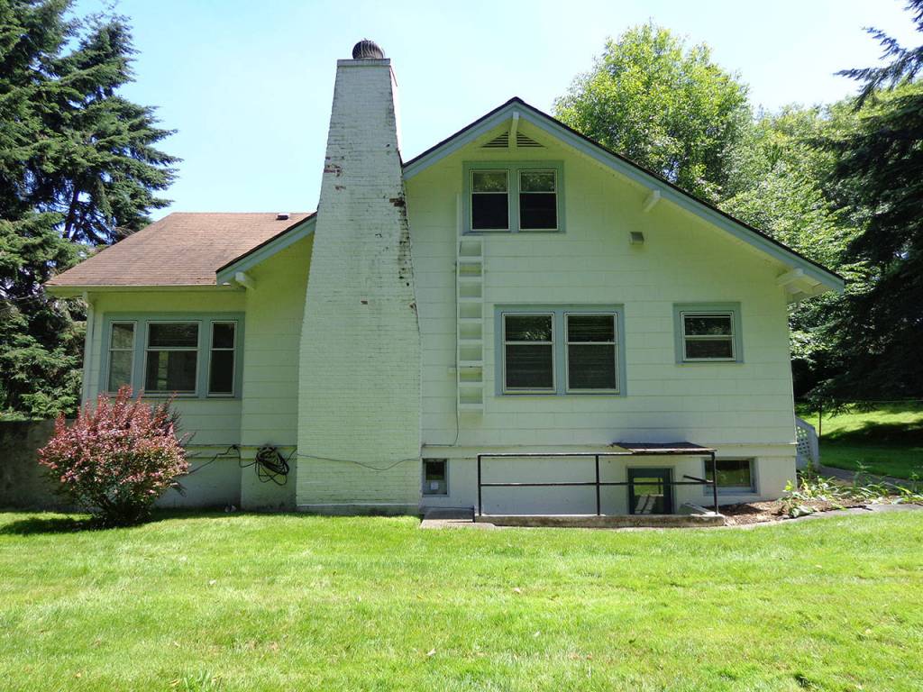 Quarters F, built in 1935, is one of eight historic farmhouses near Ault Field slated for demolition, possibly as early as this year. Pacific Northwest Communities, LLC, which owns the homes, is offering the homes for free although the buyers must pay to move them to a new location. Photo provided by NAS Whidbey