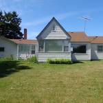 Quarters G, built in 1935 but moved later to make room for Ault Field runway expansion, is one of eight historic farmhouses slated for demolition, possibly as early as this year. Pacific Northwest Communities, LLC, which owns the homes, is offering the homes for free although the buyers must pay to move them to a new location. Photo provided by NAS Whidbey