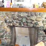 A rock fireplace inside Quarters I, the farmhouse built in 1930. Photo provided by NAS Whidbey