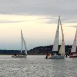 Vertigo heads the fleet out of the harbor. (Photo by Beth Munns)