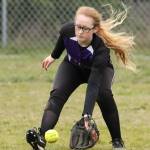 Freshman centerfielder Haley Abbott scoops up a Mount Vernon base hit Wednesday. (Photo by J0hn Fisken)