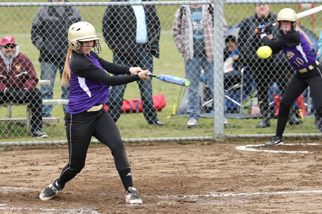 Cierra LeGendre rips a hit for Oak Harbor. (Photo by John Fisken)